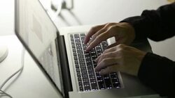 Businessman hands working on laptop computer Stock Footage