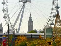 T/L London Eye with Big Ben in background, with zoom in, London, England Stock Footage