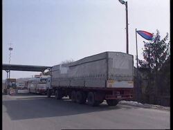 BOSNIA: BOSANSKA RACA: TRUCKS WAIT FOR CLEARANCE TO ENTER BOSNIA Instructional Video