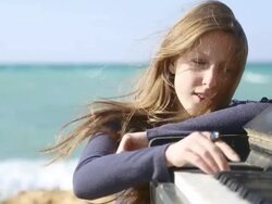 girl playing on an old piano Stock Footage