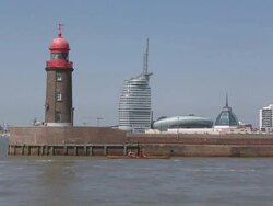 WS View of port entrance with lighthouse / Bremerhaven, Bremen, Germany Stock Footage