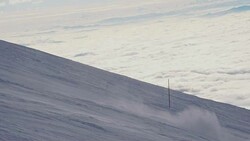 SLO MO People skiing down ski slope Stock Footage
