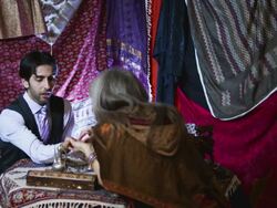 Gypsy Reads Palm of Young Man Stock Footage