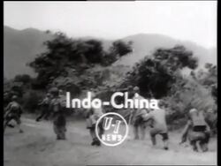 B/W 1960's soldiers walking suddenly kneel on ground / Graphics superimposed / SOUND Stock Footage