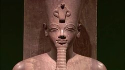 The statue of an Egyptian pharaoh sits on a stone throne in Luxor. Stock Footage