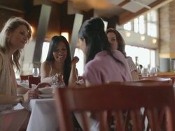 Friends sharing dessert at restaurant table Stock Footage
