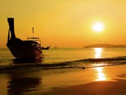 Lonely boat and beautiful sunset at the sea Stock Footage