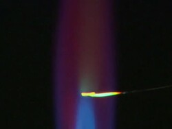A flame test used in chemistry to detect the presence of certain metal ions, based on each elements characteristic emission spectrum (Barium Carbonate) Stock Footage