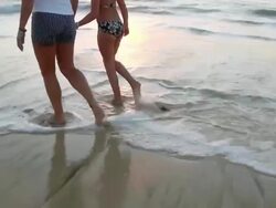 MS TS View of Mother and her girl walking on beach near Santa Maria / Santa Maria, Sal, Cape Verde Stock Footage