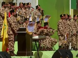 Hezbollah band performs for the crowd at a rally in Baka Stock Footage