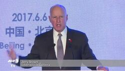 VOICED : En China el gobernador de California pide mas accion por clima News Clip