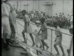 Local school children and their teachers are invited on board HMS Ashanti at Takoradi.  1939 Stock Footage
