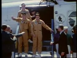 Astronauts waving as they are getting off helicopter / Apollo 17 Stock Footage