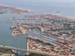 WS AERIAL View of Port Leucate city with landscape / Languedoc Roussillon, France Stock Footage