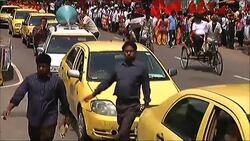 Workers rally to demand wage increases and labour rights News Clip