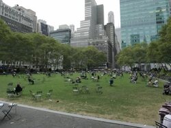 MS T/L People sitting in park near bryant park / New York, United States Stock Footage