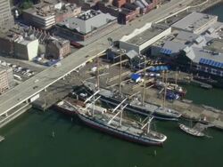 AERIAL Peking and Lightship Ambrose at South Street Seaport / New York City, New York, USA Stock Footage