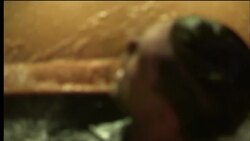 An accident victim tries to escape a sinking car. Stock Footage