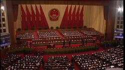 China's top legislator delivers annual report at National People's Congress News Clip
