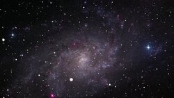 Space travel towards the M33 Galaxy Stock Footage