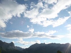 Time lapse view of clouds above mountains Stock Footage