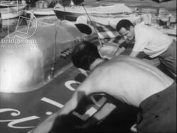 Beaches and speedboat racing in Cannes. Southern France, 1955 Stock Footage