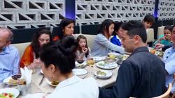 MS PAN Multigenerational family sharing appetizers together during party in restaurant Stock Footage