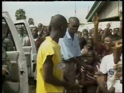 GNS WRAP Boy hit by car, police opens fire to let US team through News Clip