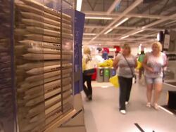 IKEA shoppers browsing goods News Clip