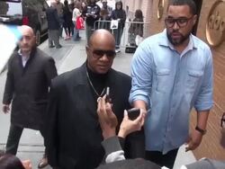 Stevie Wonder arrives at The View show, poses for photos with fans in New York City Stock Footage