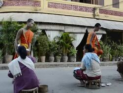 MS Buddhist Monks collecting alms in morning / Luang Prabang, Luang Prabang, Laos Stock Footage