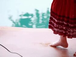 MS TU TD PAN Three female models in front of pool / Montezuma, Punteranes, Costa Rica Stock Footage