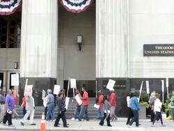 Protesters march outside Detroit bankruptcy court. Stock Footage