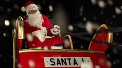 Father Christmas Flying his sleigh in the snow Stock Footage