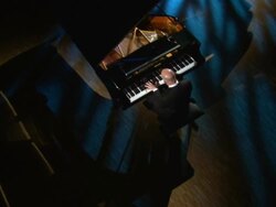 HD CRANE: Pianist Playing In A Concert Hall Stock Footage