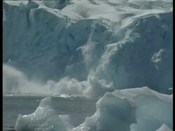 WA ice breaking off iceberg, crashing into sea, edited sequence, Antarctica Stock Footage