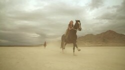 (Slow Motion) Riding Horses in the Dessert 03 Stock Footage