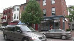 Traffic flows past small shops in Gettysburg, Pennsylvania. Stock Footage