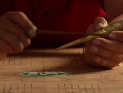 MS Sand smoothly  being poured out of  funnel  to create a design on  mandala  / Kathmandu, Central, Nepal Stock Footage