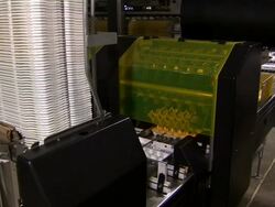 Medium shot of machine packaging eggs. Stock Footage