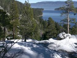 Lake Tahoe mountain climber and lake creek Stock Footage
