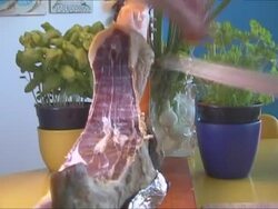 Slicing prosciutto Stock Footage