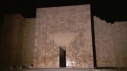 A tall, narrow door leads into a temple in Saqqara, Egypt. Stock Footage