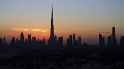United Arab Emirates, Dubai, elevated view of the new Dubai skyline, the Burj Khalifa, modern architecture and skyscrappers on Sheikh Zayed Road Stock Footage