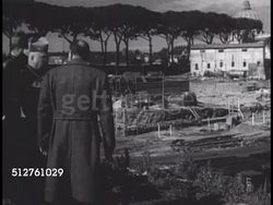 1949: THE PONTIFICAL NORTH AMERICAN COLLEGE EXPANSION: Cardinal Spellman (end), Vatican Architect Enrico Galeazzi & two men looking at construction site on Vaticanum (Vatican Hill), workers making masonry mortar, teen dumping wheel barrow of dirt. Instructional Video