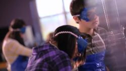 Students conduct chemistry lab experiments Stock Footage