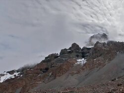 T/L clouds over, Thorung La Rockscape, Himalayas Stock Footage