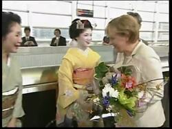 Merkel talking at symposium about environmental issues, on bullet train News Clip