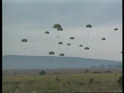 CONGO: MULTINATIONAL FORCES STAGE PRACTICE PARACHUTE JUMP News Clip