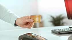 Handing out the credit card to the salesperson Stock Footage